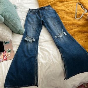 Flared jeans with slit on inside